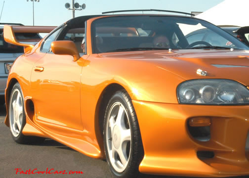 Lowriders that have been lowered, dropped, slammed, and scraping.