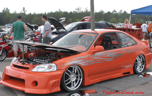 Lowriders that have been lowered, dropped, slammed, and scraping.