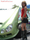Lowriders that have been lowered, dropped, slammed, and scraping. Pretty model, and tilt hood, sweet.