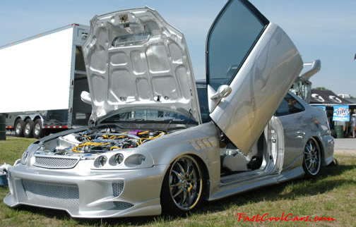 Lowriders that have been lowered, dropped, slammed, and scraping. Killer door kit.