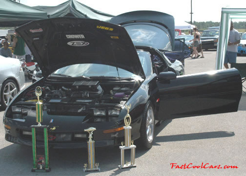 Lowriders that have been lowered, dropped, slammed, and scraping.