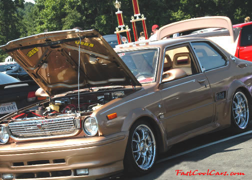 Lowriders that have been lowered, dropped, slammed, and scraping.