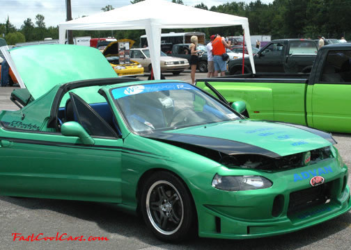 Lowriders that have been lowered, dropped, slammed, and scraping.