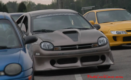 Lowriders that have been lowered, dropped, slammed, and scraping.
