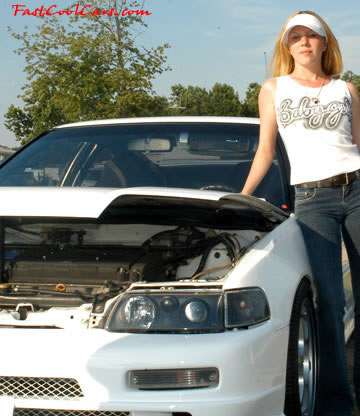 Lowriders that have been lowered, dropped, slammed, and scraping. Sexy lady.