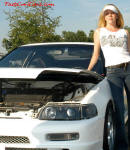 Lowriders that have been lowered, dropped, slammed, and scraping. Sexy lady.