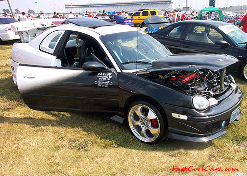 Lowriders that have been lowered, dropped, slammed, and scraping.