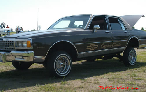 Lowriders that have been lowered, dropped, slammed, and scraping.