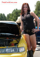 Lowriders that have been lowered, dropped, slammed, and scraping. Pretty young lady.