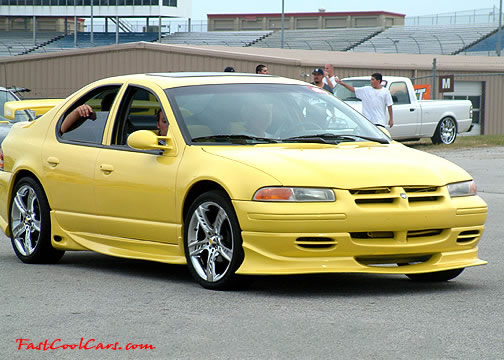 Lowriders that have been lowered, dropped, slammed, and scraping.