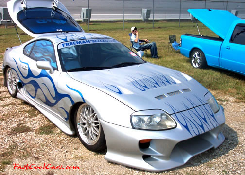 Lowriders that have been lowered, dropped, slammed, and scraping. Toyota Supra low rider.