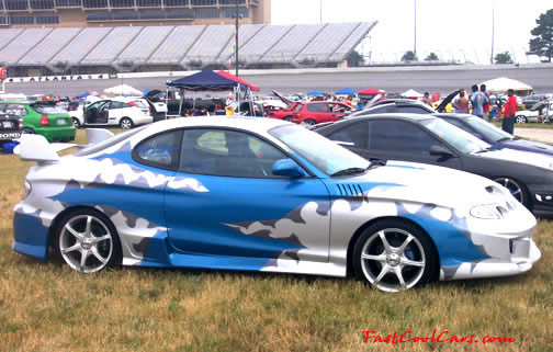 Lowriders that have been lowered, dropped, slammed, and scraping.