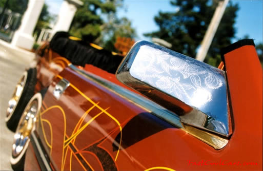 Lowriders that have been lowered, dropped, slammed, and scraping, using many different modifications. Custom paint