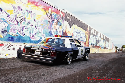 Lowriders that have been lowered, dropped, slammed, and scraping, using many different modifications. slammed police car