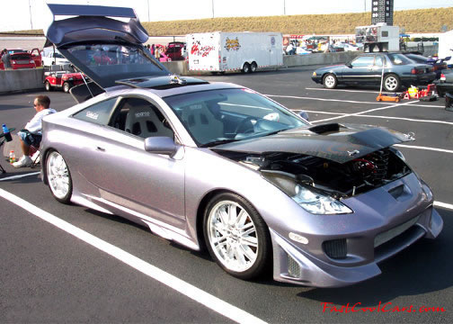 Lowriders that have been lowered, dropped, slammed, and scraping, using many different modifications.