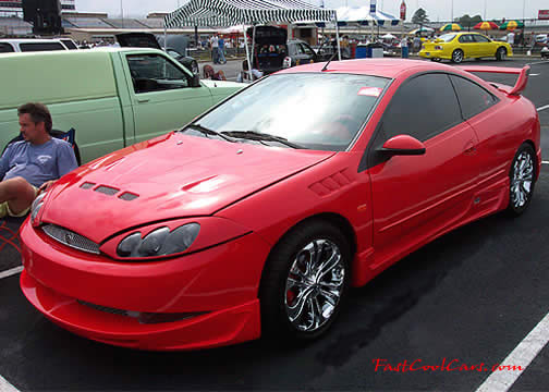 Lowriders that have been lowered, dropped, slammed, and scraping, using many different modifications.