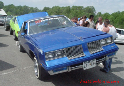 Lowriders that have been lowered, dropped, slammed, and scraping, using many different modifications.