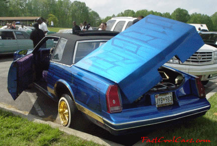 Lowriders that have been lowered, dropped, slammed, and scraping, using many different modifications.