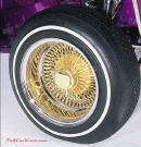 Lowriders that have been lowered, dropped, slammed, and scraping, Wire Rims.