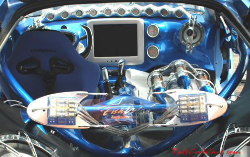 Lowriders that have been lowered, dropped, slammed, and scraping.