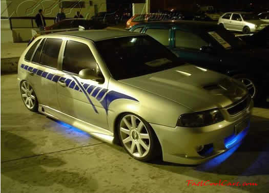 Lowriders that have been lowered, dropped, slammed, and scraping.