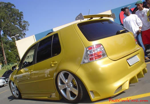 Lowriders that have been lowered, dropped, slammed, and scraping.