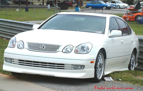 Lowriders that have been lowered, dropped, slammed, and scraping.