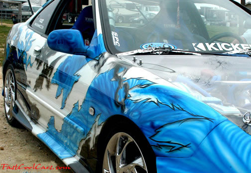 Lowriders that have been lowered, dropped, slammed, and scraping. Cool custom graphics.