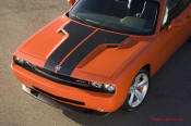 New Dodge Challenger, 6.1 V8 Hemi, 425 crank horsepower, 420 crank foot pounds of torque. SRT8, carbon fiber shows through hood paint.