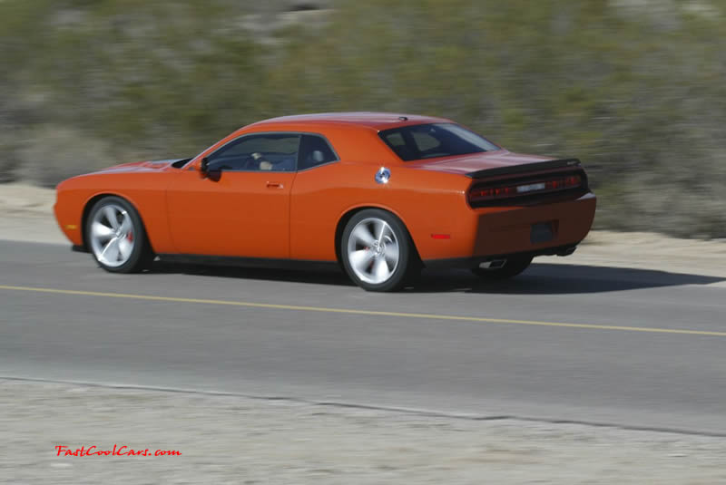 New Dodge Challenger, 6.1 V8 Hemi, 425 crank horsepower, 420 crank foot pounds of torque. SRT8