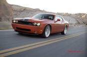 New Dodge Challenger, 6.1 V8 Hemi, 425 crank horsepower, 420 crank foot pounds of torque. SRT8