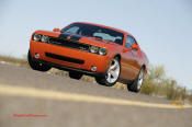 New Dodge Challenger, 6.1 V8 Hemi, 425 crank horsepower, 420 crank foot pounds of torque. SRT8, it looks fast, just sitting there.