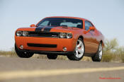 New Dodge Challenger, 6.1 V8 Hemi, 425 crank horsepower, 420 crank foot pounds of torque. SRT8