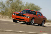 New Dodge Challenger, 6.1 V8 Hemi, 425 crank horsepower, 420 crank foot pounds of torque. SRT8