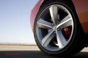 New Dodge Challenger, 6.1 V8 Hemi, 425 crank horsepower, 420 crank foot pounds of torque. SRT8, nice looking rims.