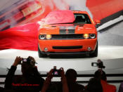 New Dodge Challenger, 6.1 V8 Hemi, 425 crank horsepower, 420 crank foot pounds of torque. SRT8