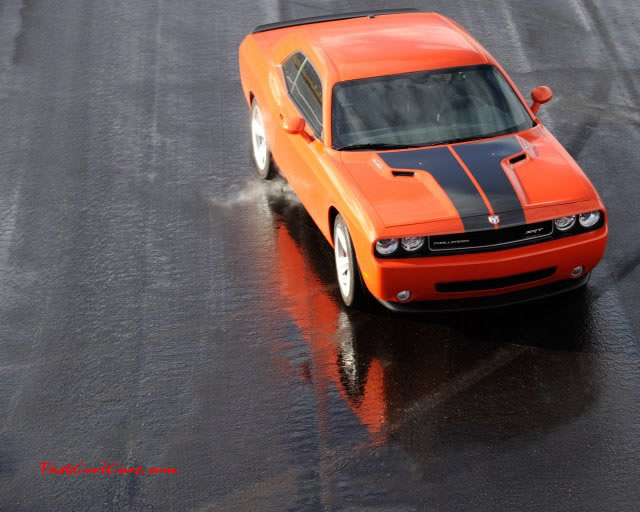 New Dodge Challenger, 6.1 V8 Hemi, 425 crank horsepower, 420 crank foot pounds of torque. SRT8