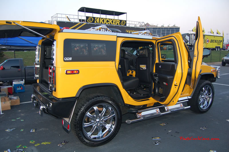 Pimped out ride, Pimp my ride with custom Yellow paint, on this Hummer with huge chrome wheels.