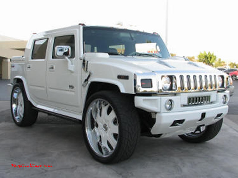 Pimped out ride, Pimp my ride with custom white paint, and huge custom white and chrome wheels, one nice Hummer.