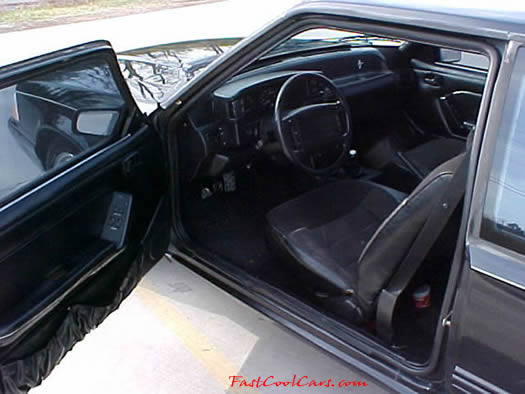 Drivers door inside view of 1991 LX Mustang, all black interior.