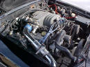 Right side view of under the hood of 91' LX coupe 5.0 H.O. - chrome cold air intake with K&N filter, performance wires, underdrive pulley, daily driver