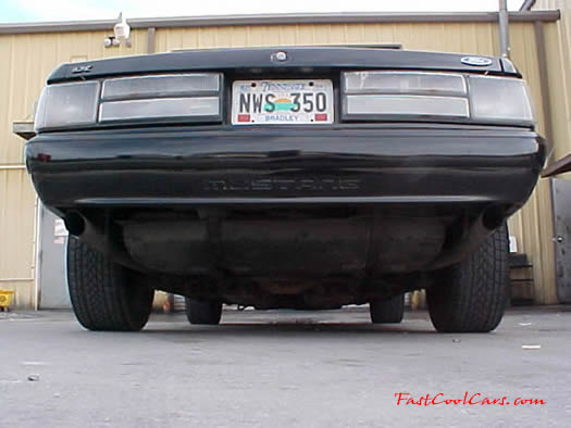 Rear ground level view of 91' LX coupe, nice polished 2-1/2" stainless steel dual exhaust