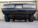 Rear ground level view of 91' LX coupe, nice polished 2-1/2" stainless steel dual exhaust