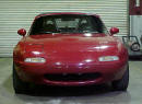 1990 Mazda Miata Roadster front view with the top up
