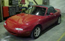 1990 Mazda Miata Roadster left front angle view with the top up