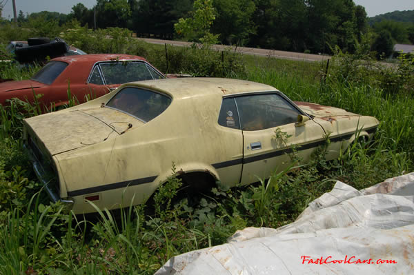 1971 Yellow Ford Mustang, $450 - Rare collectible vintage classic cars for sale.