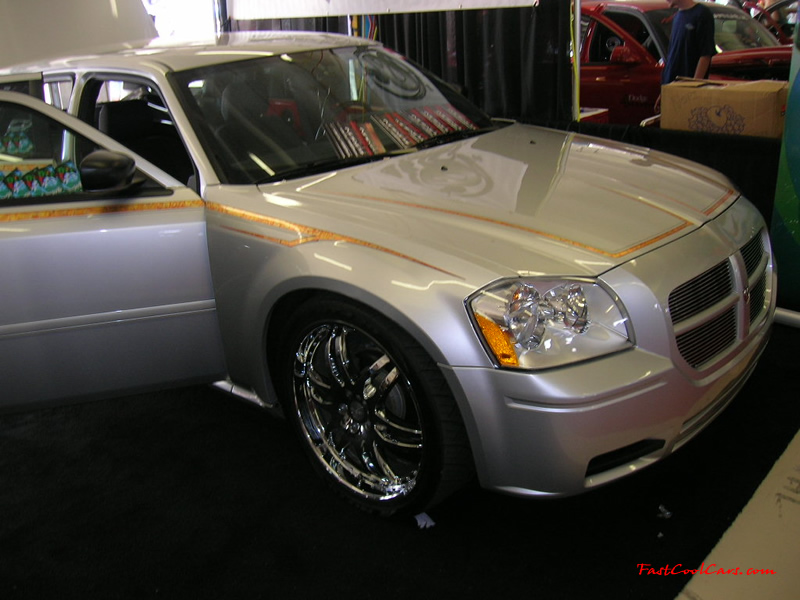 Nopi Nationals - Motorsports Supershow 2005, Dodge Magnum, lowrider. Huge wheels.