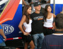 Nick Hogan and a couple sexy Foose models getting their picture taken.