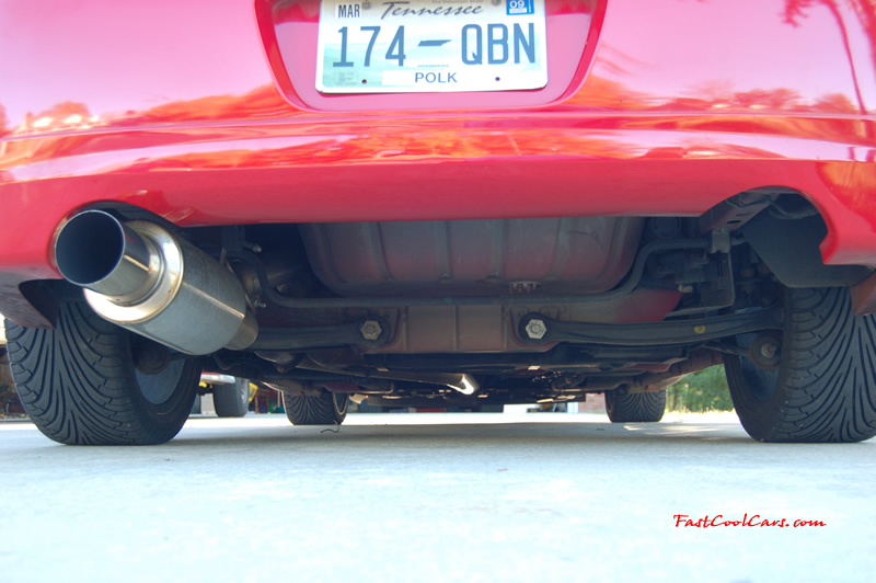 2005 Dodge SRT-4 2.4L DOHC Turbo - 3", 02 housing - 3" Turbo Back Exhaust, - 3" CAI - Brian Crower Stage 2 Cams - Monster - MSD - AEM - Walbro - Lowered - Big Turbo SOON... ( Enlarged version, High Resolution - High Quality pictures, the best fast cool car pics around. ) I always liked these ground level shots from the rear looking forward underneath.
