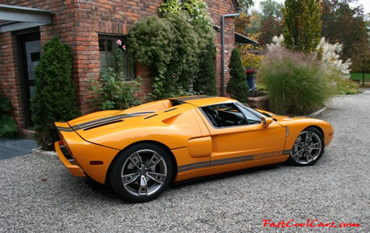 The 2005 Ford GTX1 - Gleaming orange paint with tungsten racing stripes. A removable hard-top aluminum roof. Custom designed forged modular wheels. And a 618-700 horsepower, 5.4L supercharged V-8 engine. 